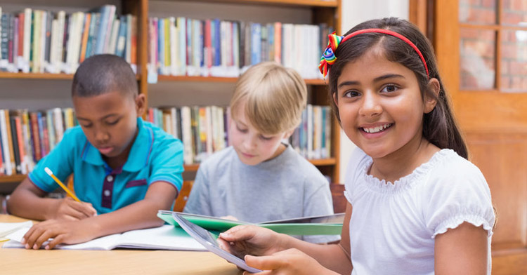 Children writing at school