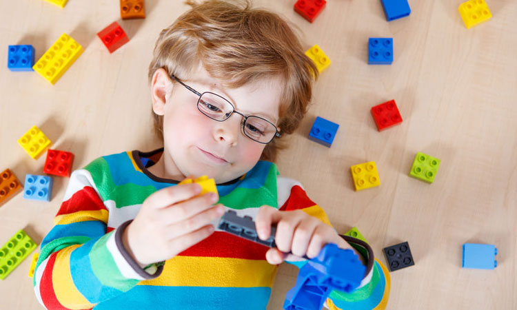 Child with building blcoks